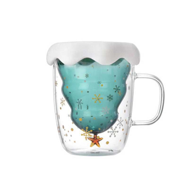 Tasse de noël en verre avec sapin intérieur