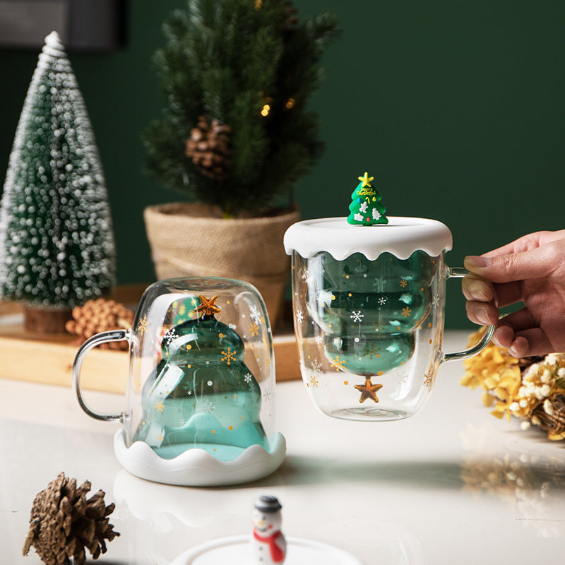 Tasse de noël en verre avec sapin intérieur